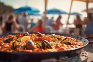 paella or bar food in summer on the beach