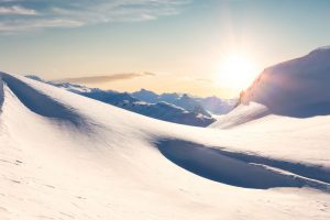Winter Landscape in Canadian Mountain Landscape. Colorful Sunrise.