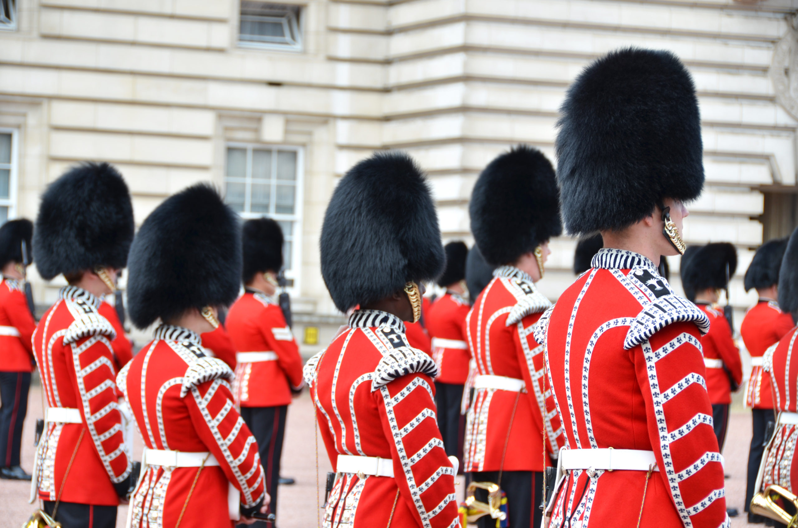 LONDON, UK – JUNE 12, 2014: British Royal guards perform the Changing of the Guard in Buckingham Palace